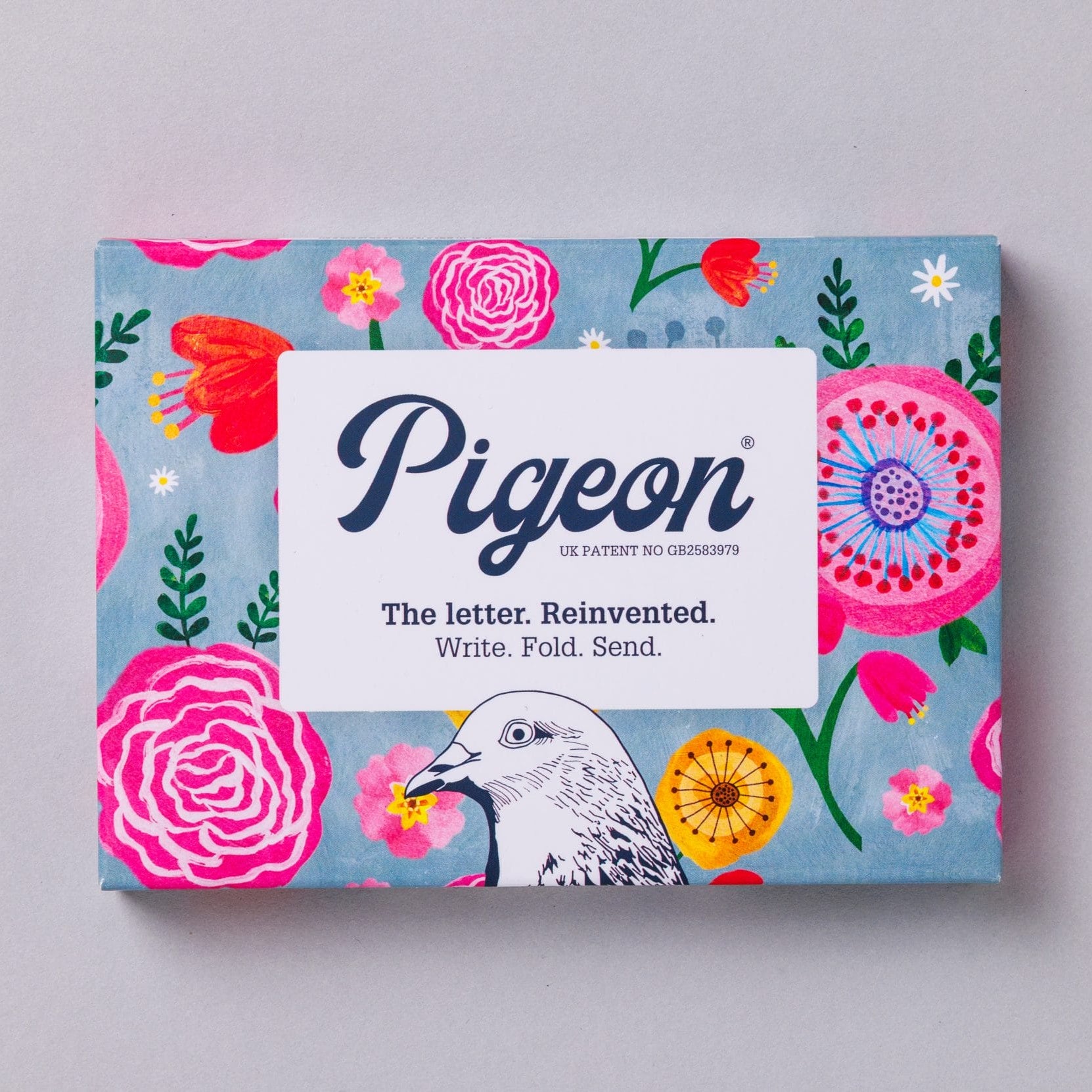 Wildflower Pigeons pack front with colourful floral design on light blue background