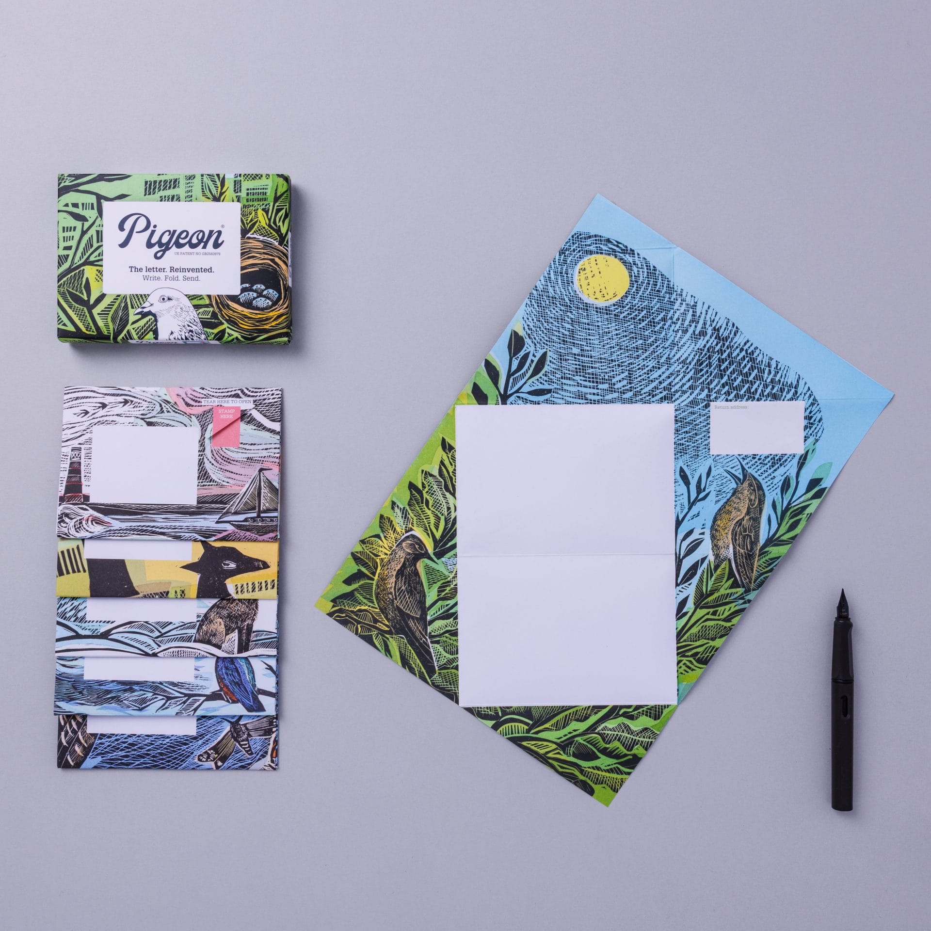 Pack and unfolded Pigeon showing wildlife prints by Angela Harding on lavender