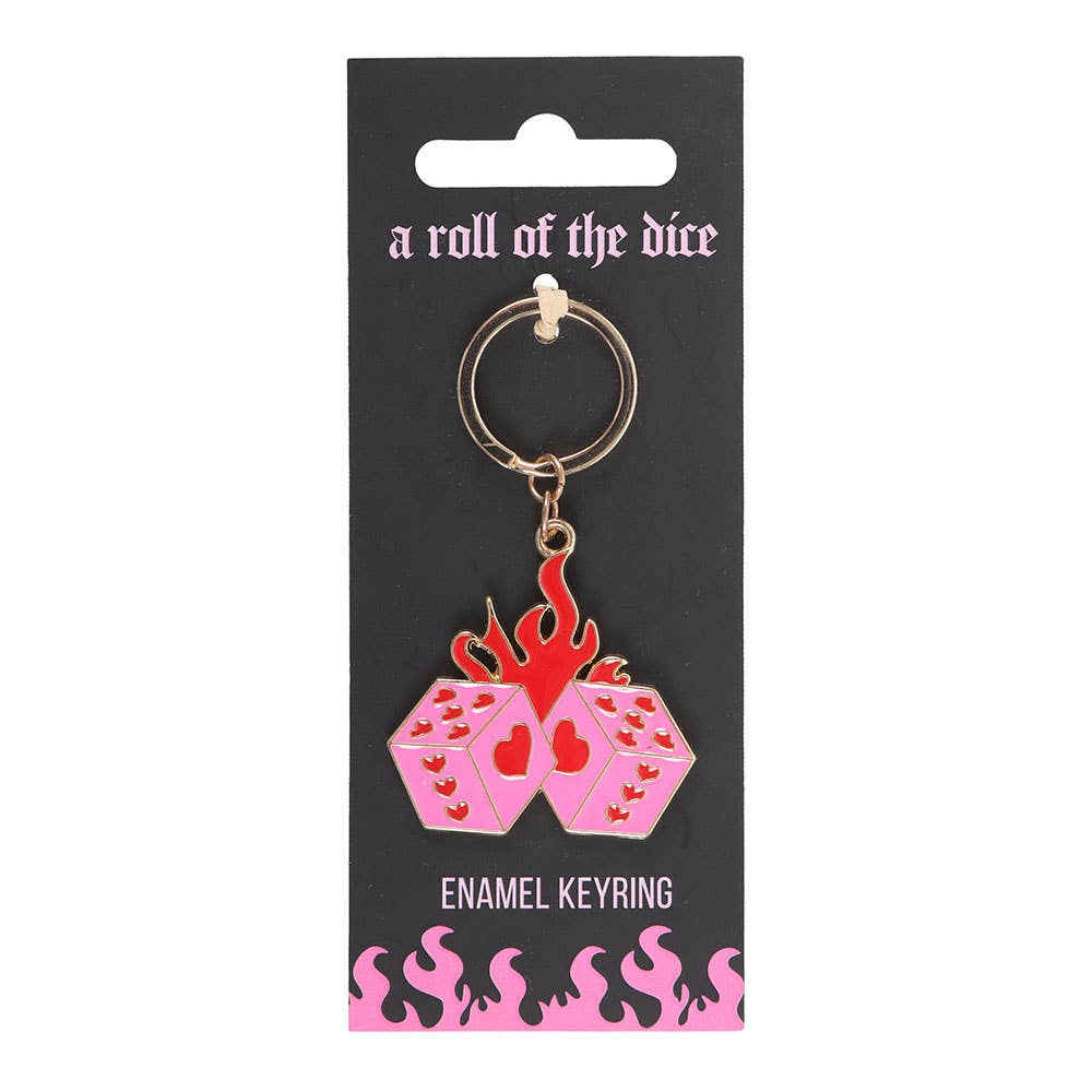 Pink dice keyring showing heart pips and flame detail close up
