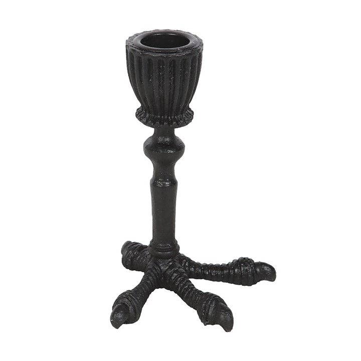 Black raven claw shaped candle holder showing talon detail