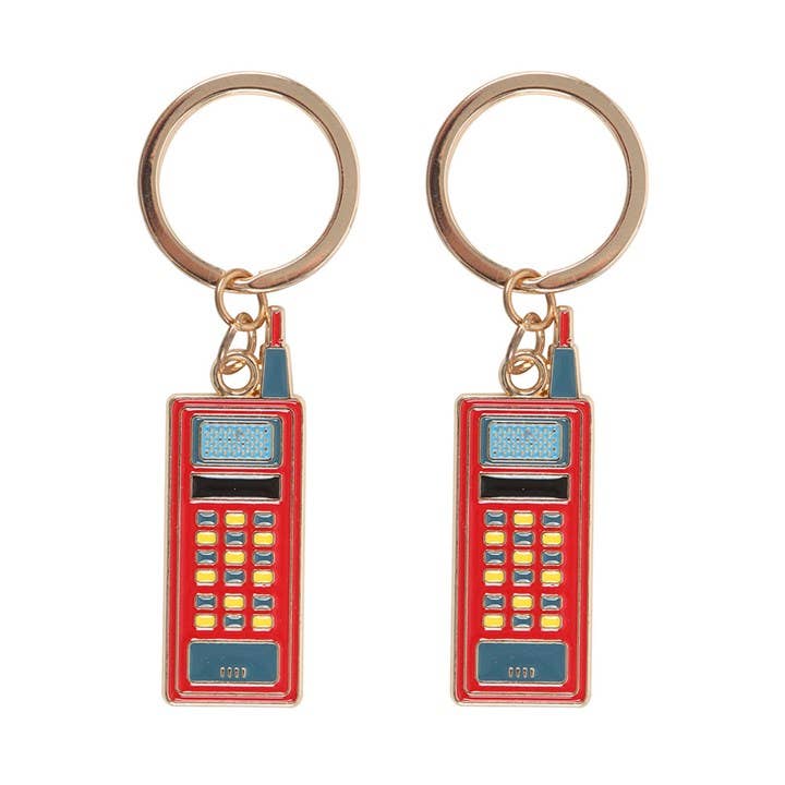 Two red enamel walkie talkie keyrings side by side on white background