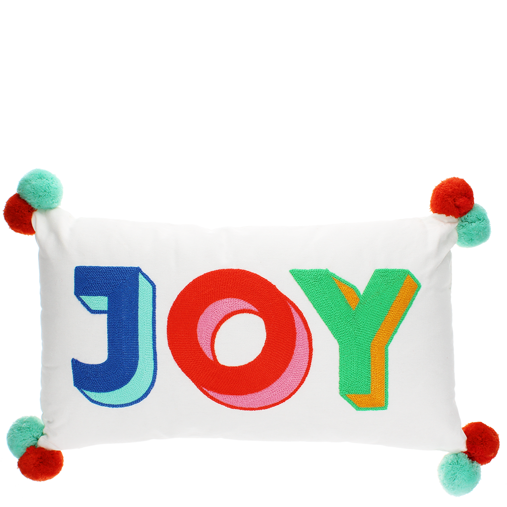 Joy embroidered pom pom cushion front view on grey background