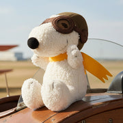 Snoopy Flying Ace soft toy in vintage aircraft cockpit lifestyle shot