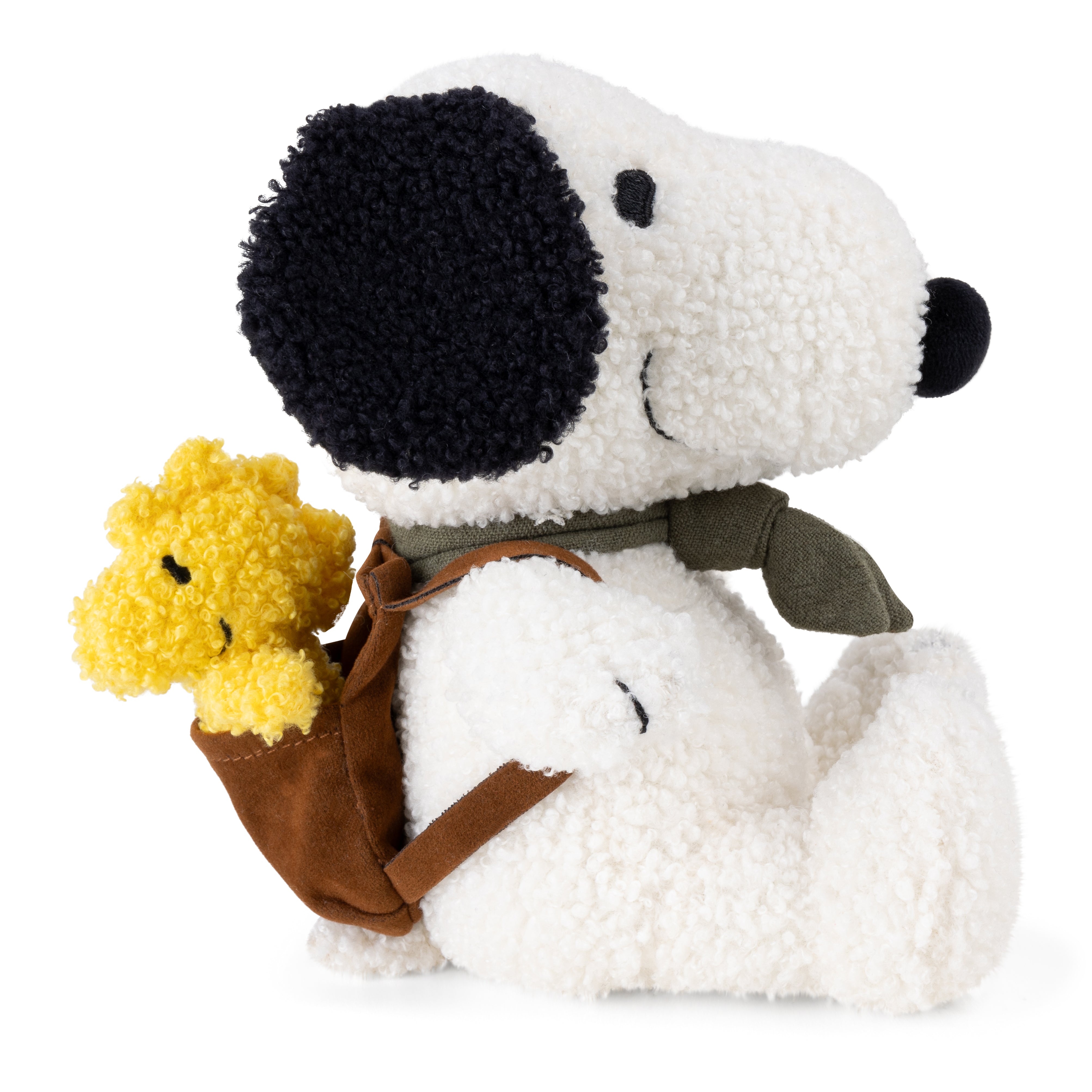 Snoopy soft toy side view with Woodstock in brown backpack