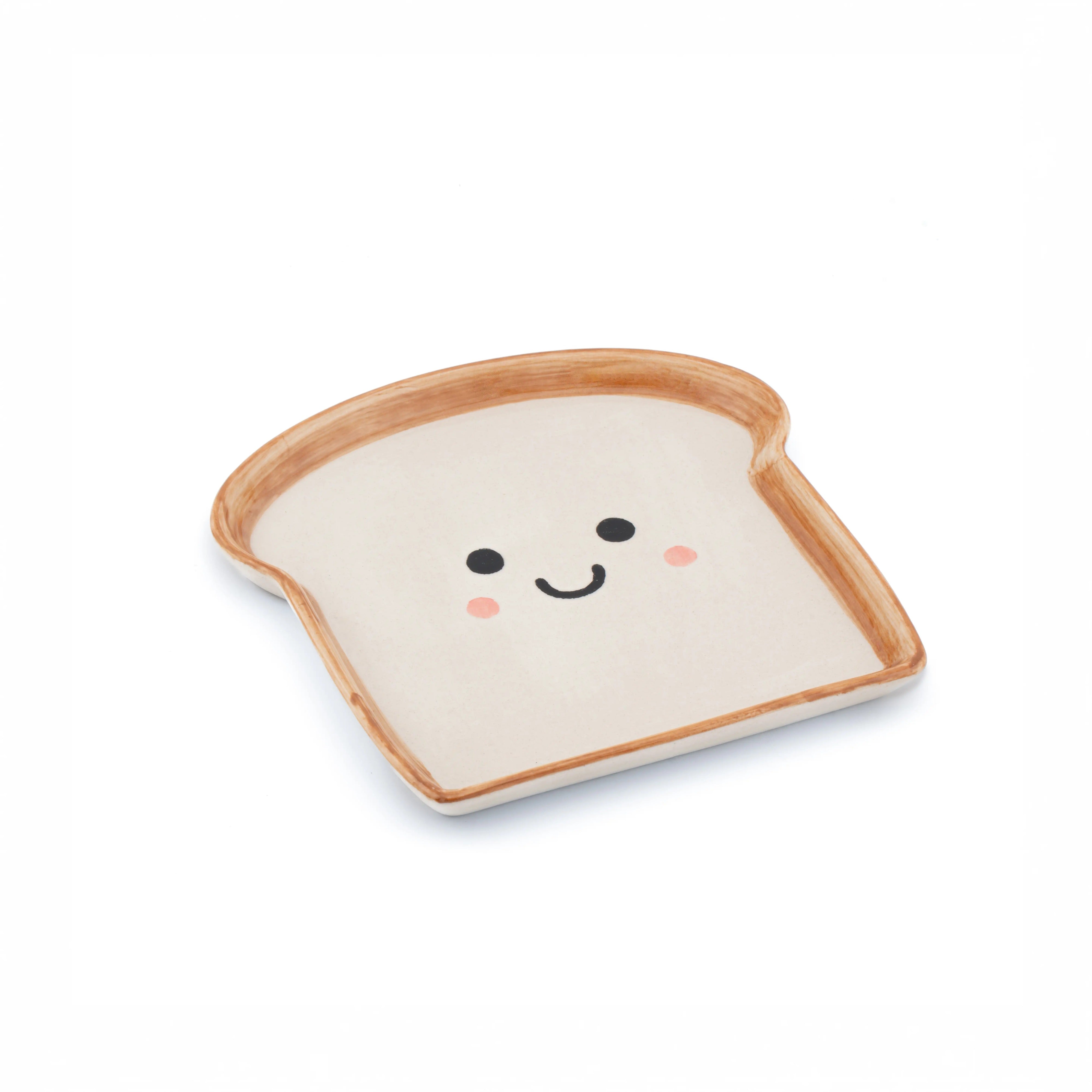 Bread slice ceramic snack plate with cute smiley face on white background