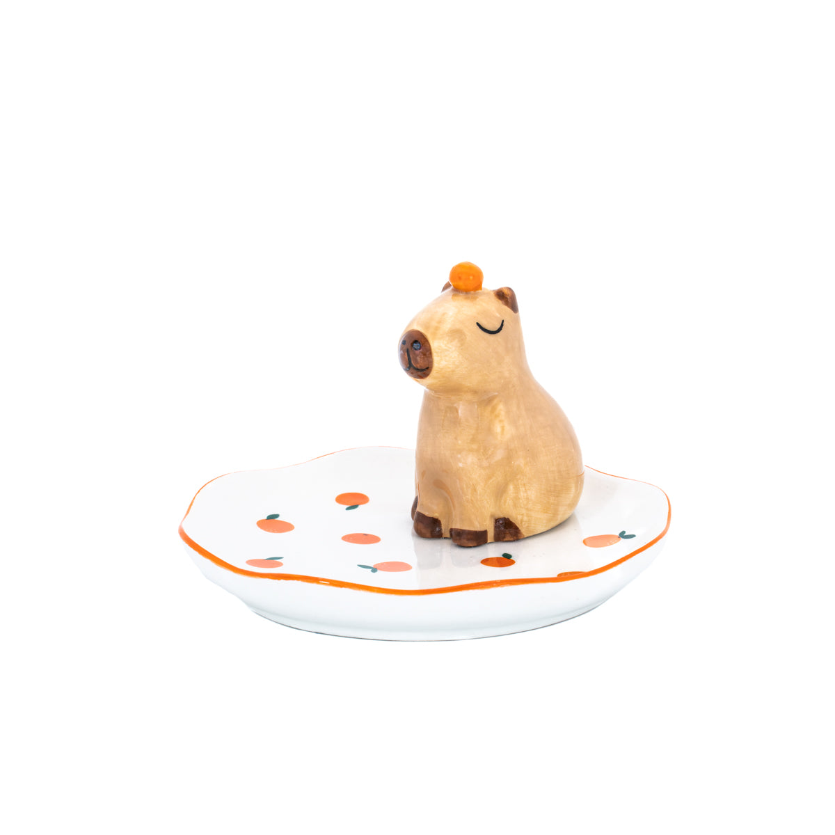 Capybara trinket dish with orange on head on white background front view
