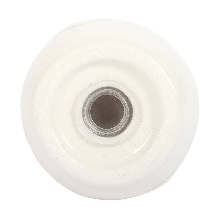 Daisy duck shaker base view showing dispensing hole on white background