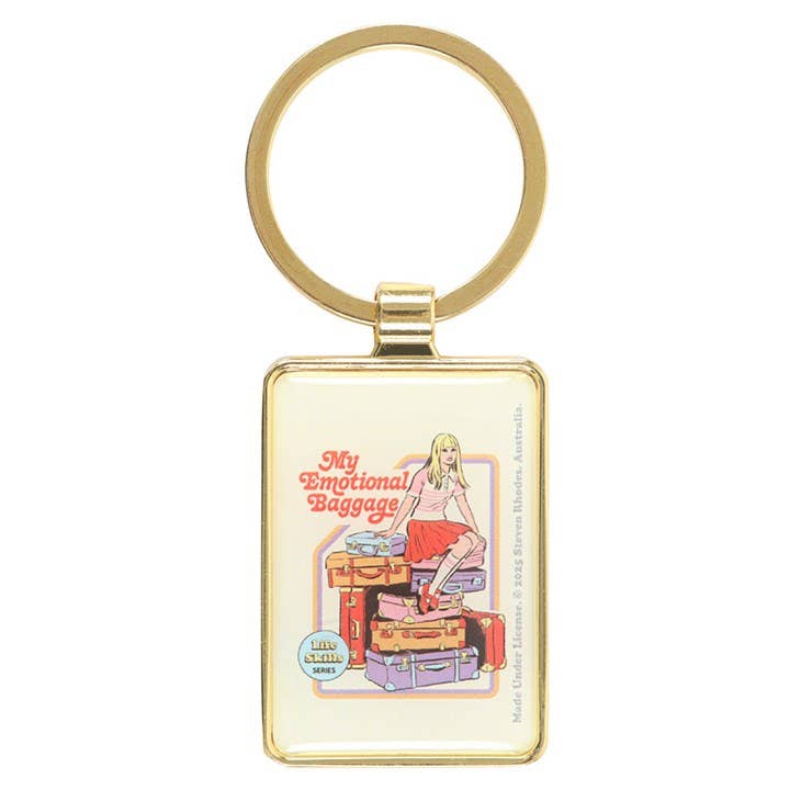 Close-up of keyring showing girl on baggage pile design