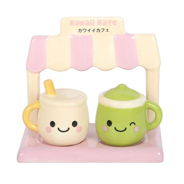 Close-up of green matcha mug and stand on white background