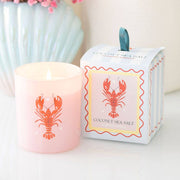 Glass candle in pastel striped box styled with coastal elements