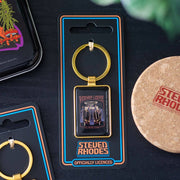 Keyring on packaging card against dark lifestyle background