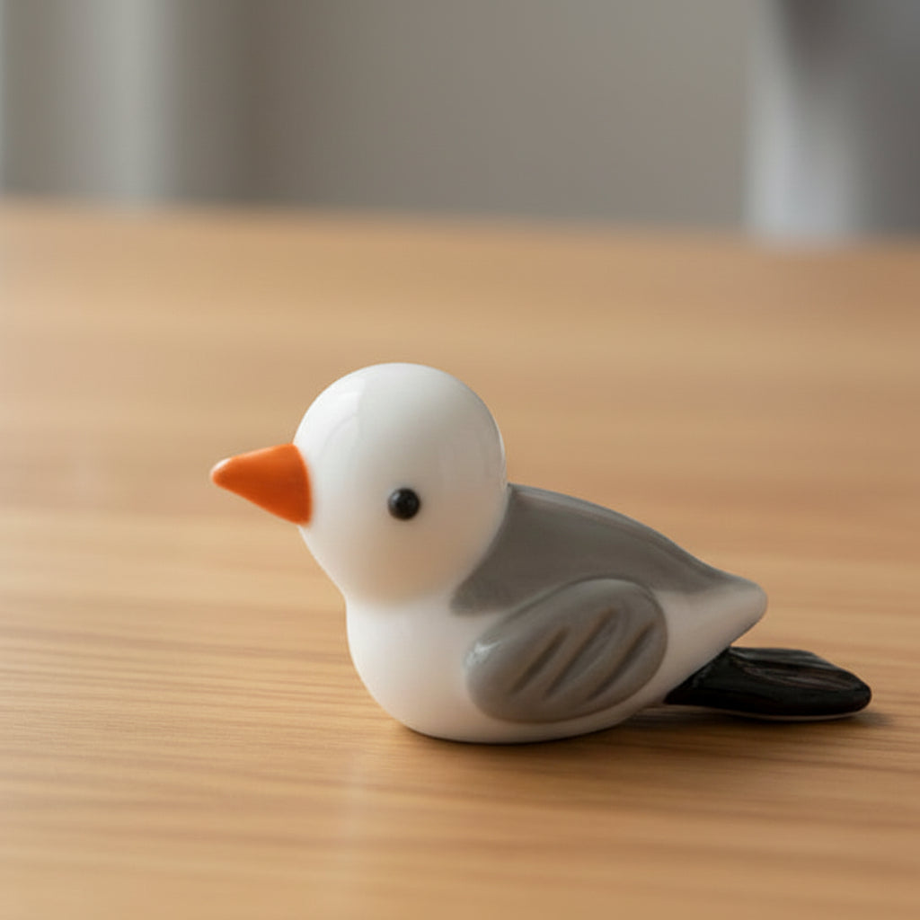 Seagull lucky charm token with fine coastal detail