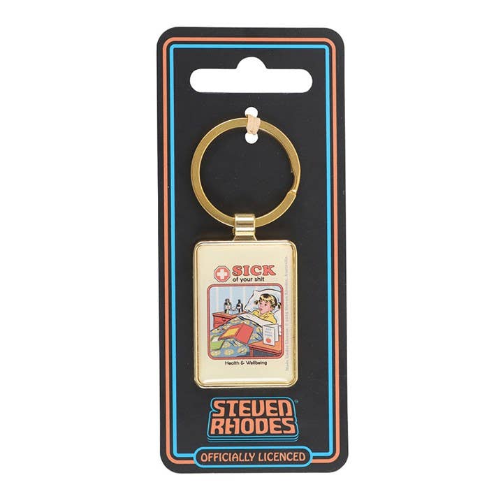 Close-up of Sick of Your Shit keyring showing retro Health and Wellbeing design