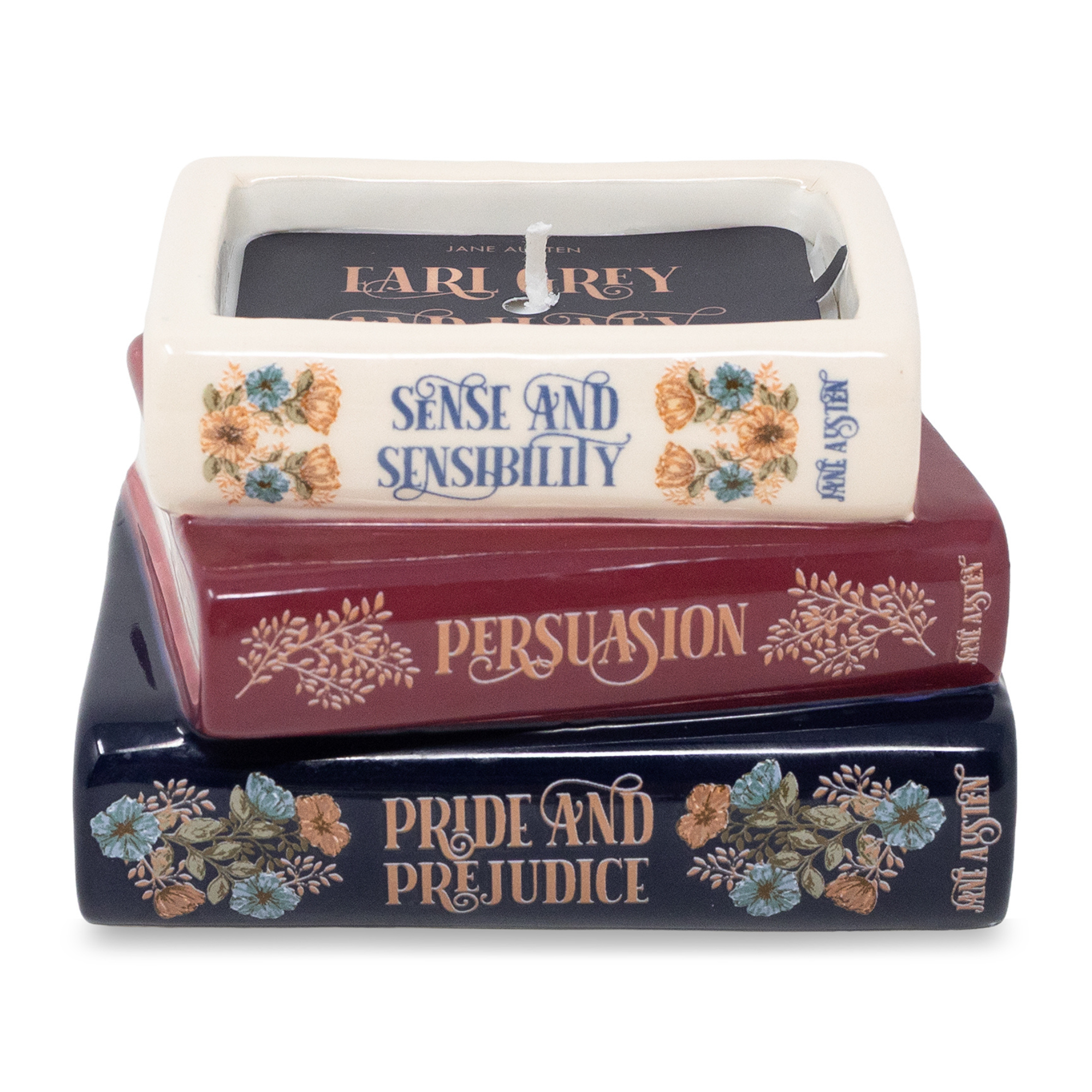 Jane Austen bookstack candle shaped like three stacked ceramic books, white background