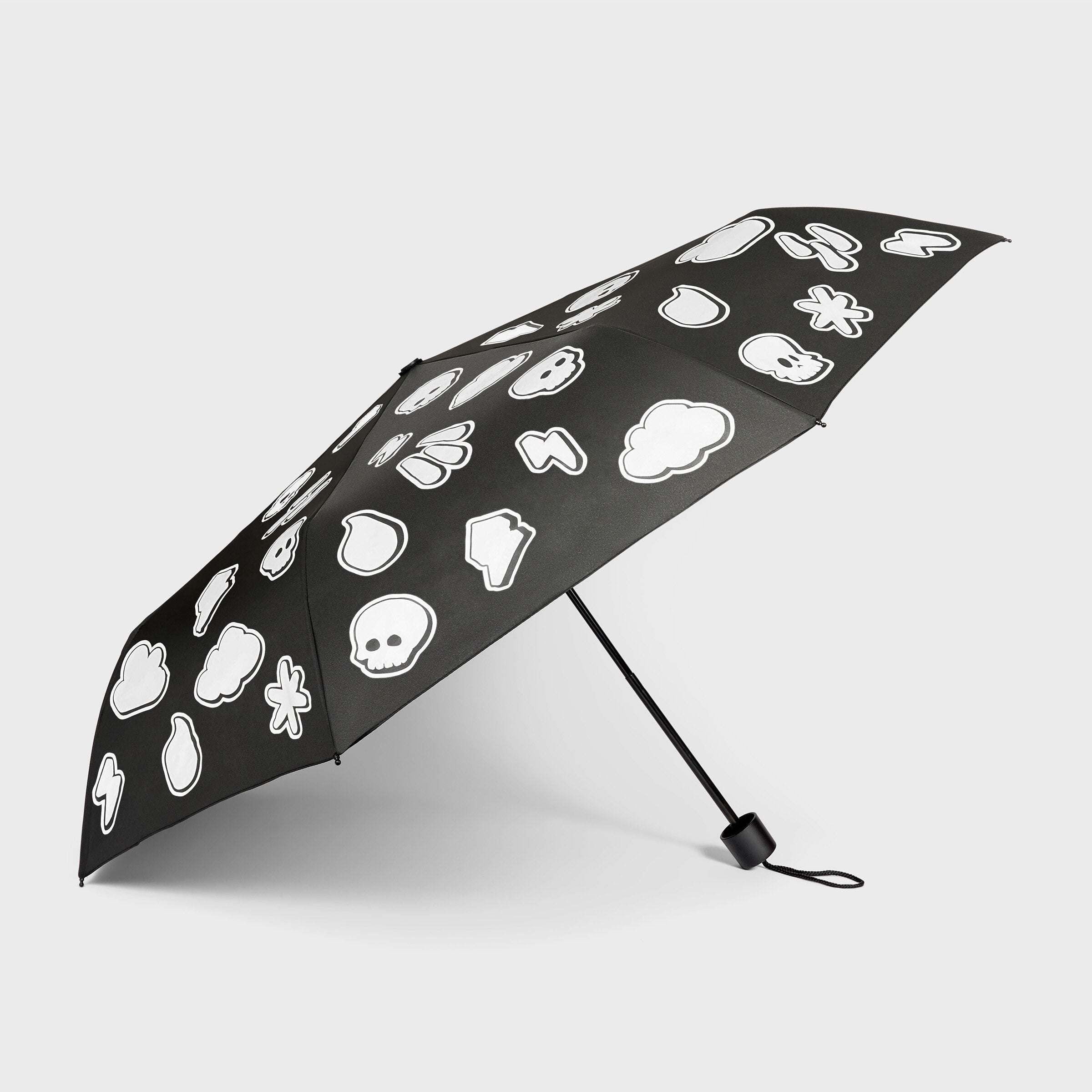 Weather pattern umbrella open side view showing compact design on grey background