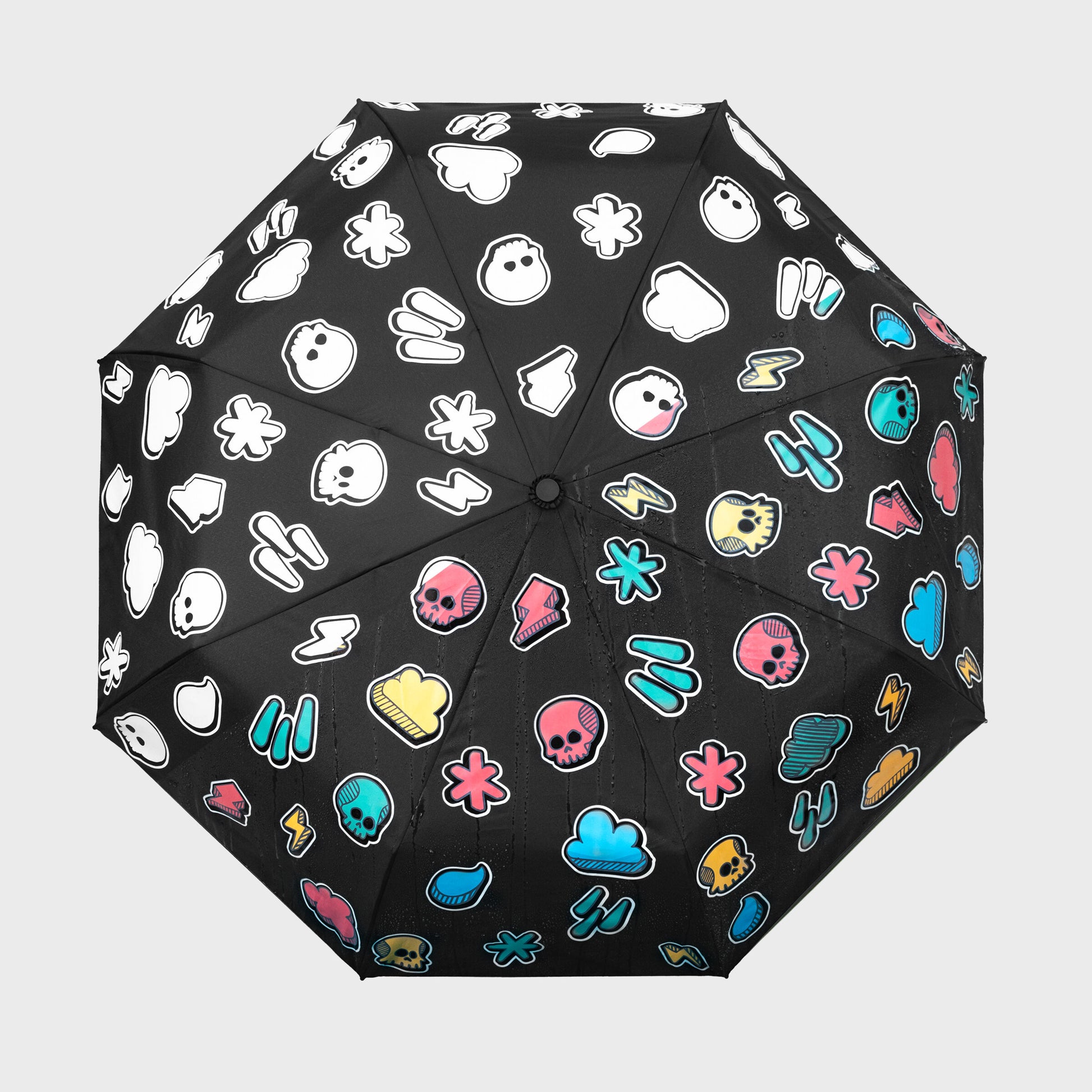 Weather pattern umbrella open from above showing white to colour transformation