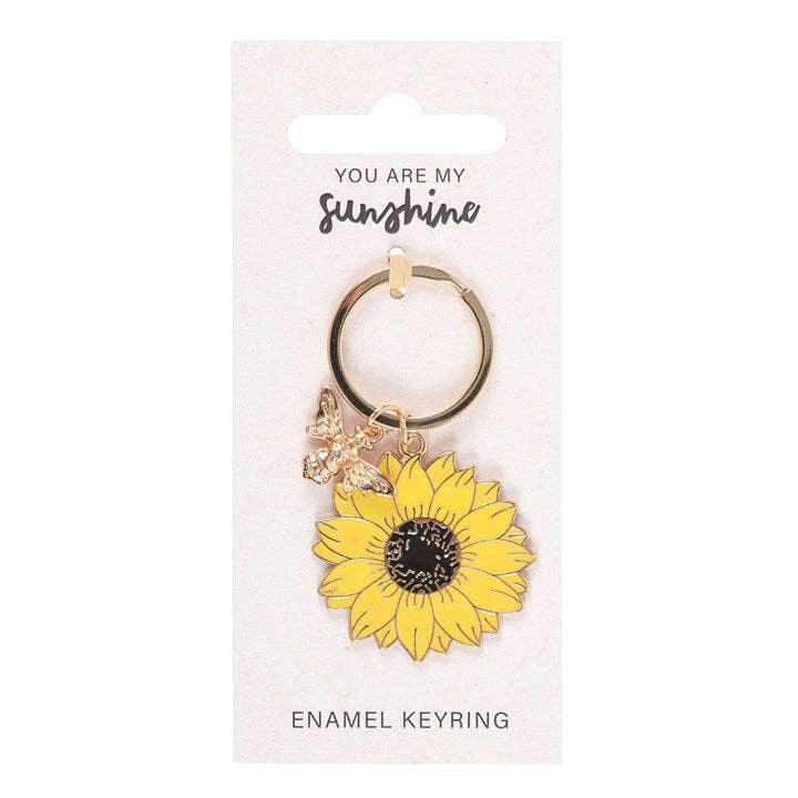 Sunflower keyring showing detailed yellow petals and gold outline