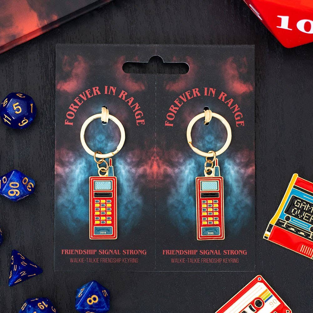Set of 2 walkie talkie keyrings on card with retro gaming backdrop