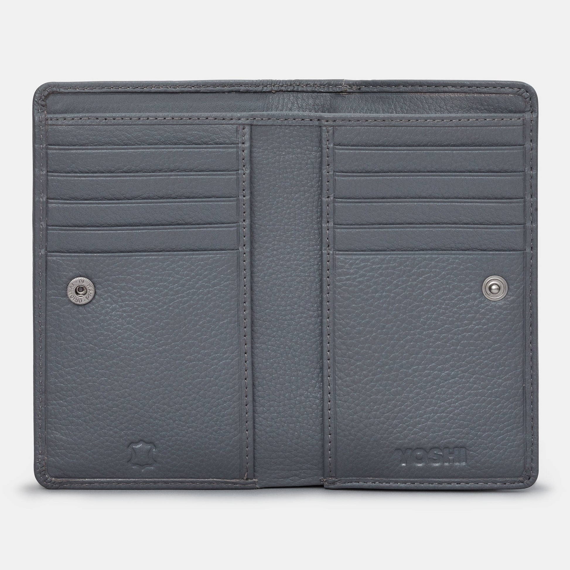Flap over purse open showing card slots and coin pocket
