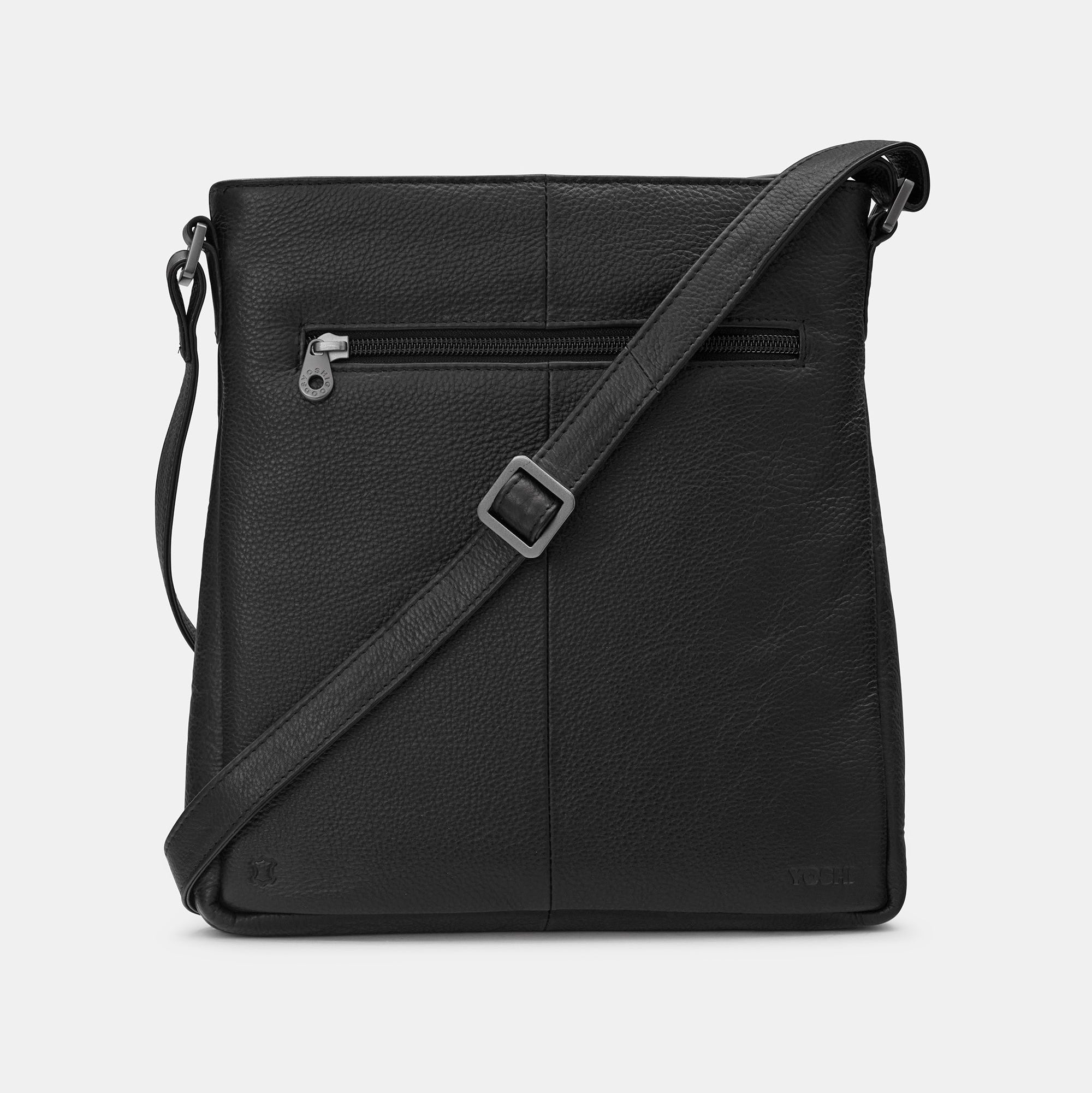Black leather crossbody bag back view showing zip pocket and Yoshi branding