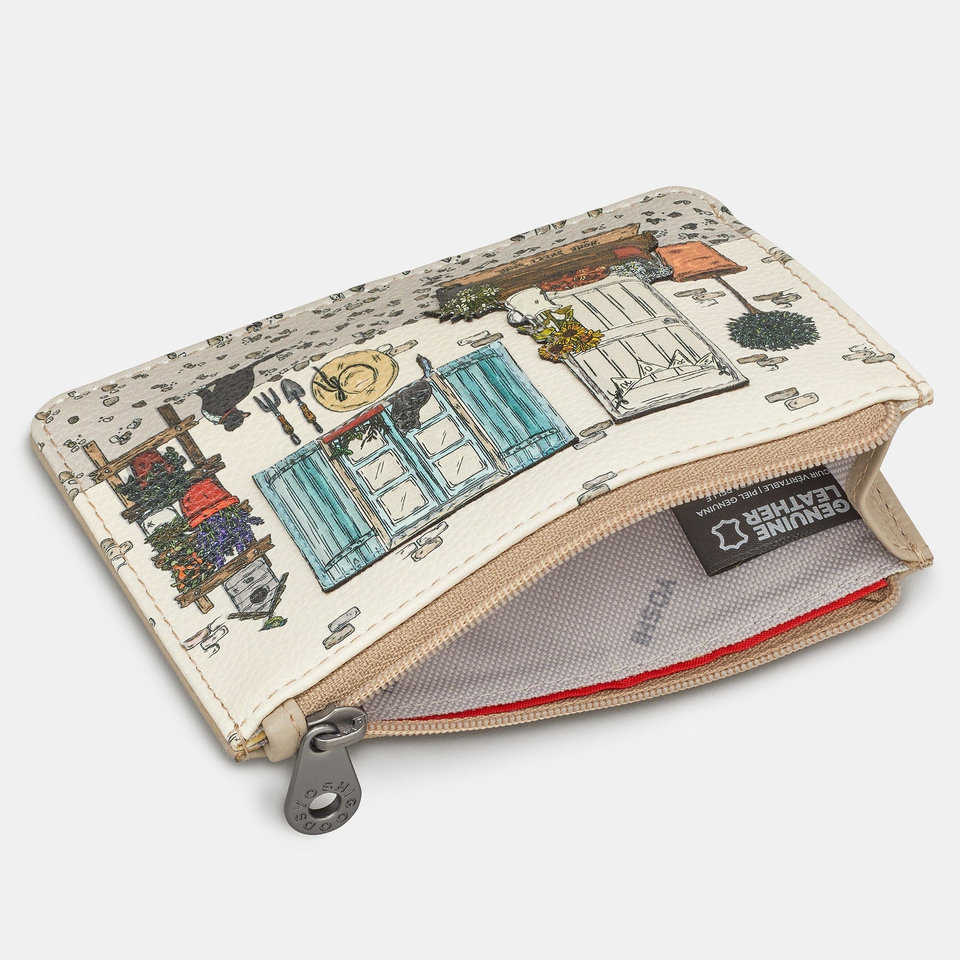 Country cottage purse overhead open showing genuine leather label and lining