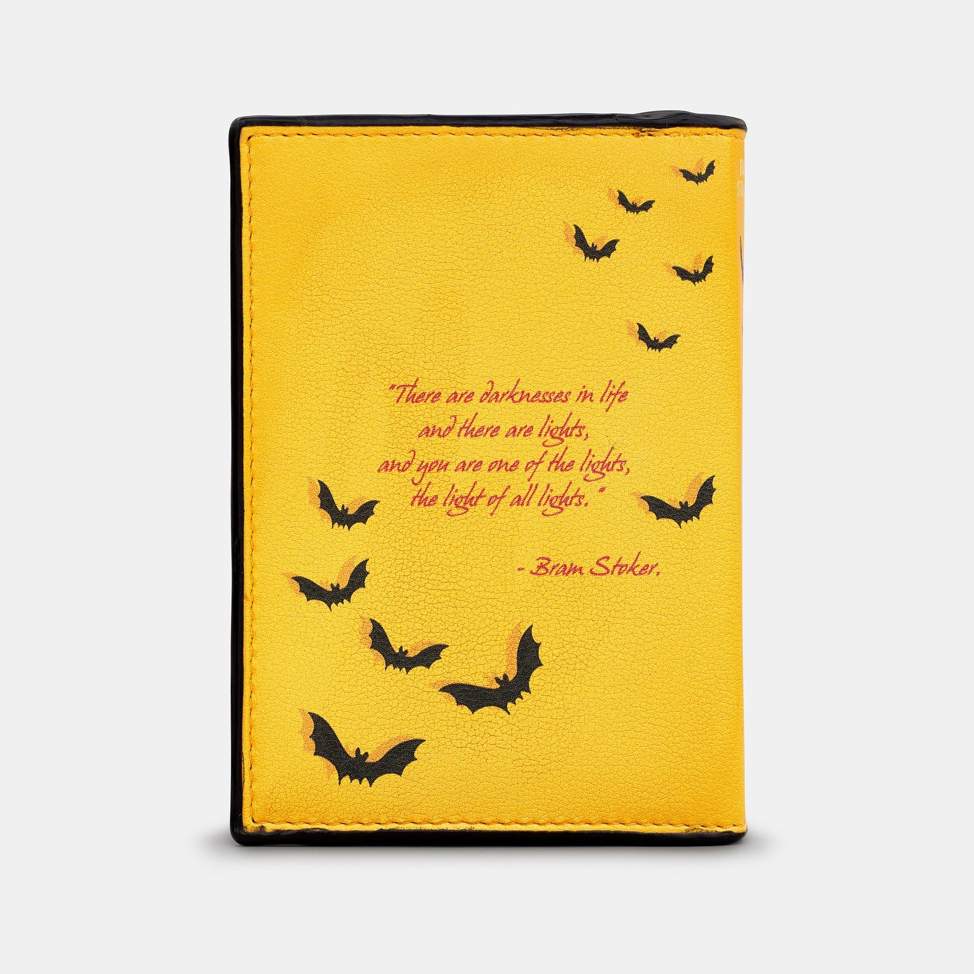 Dracula book purse back with Bram Stoker quote and bat illustrations on yellow