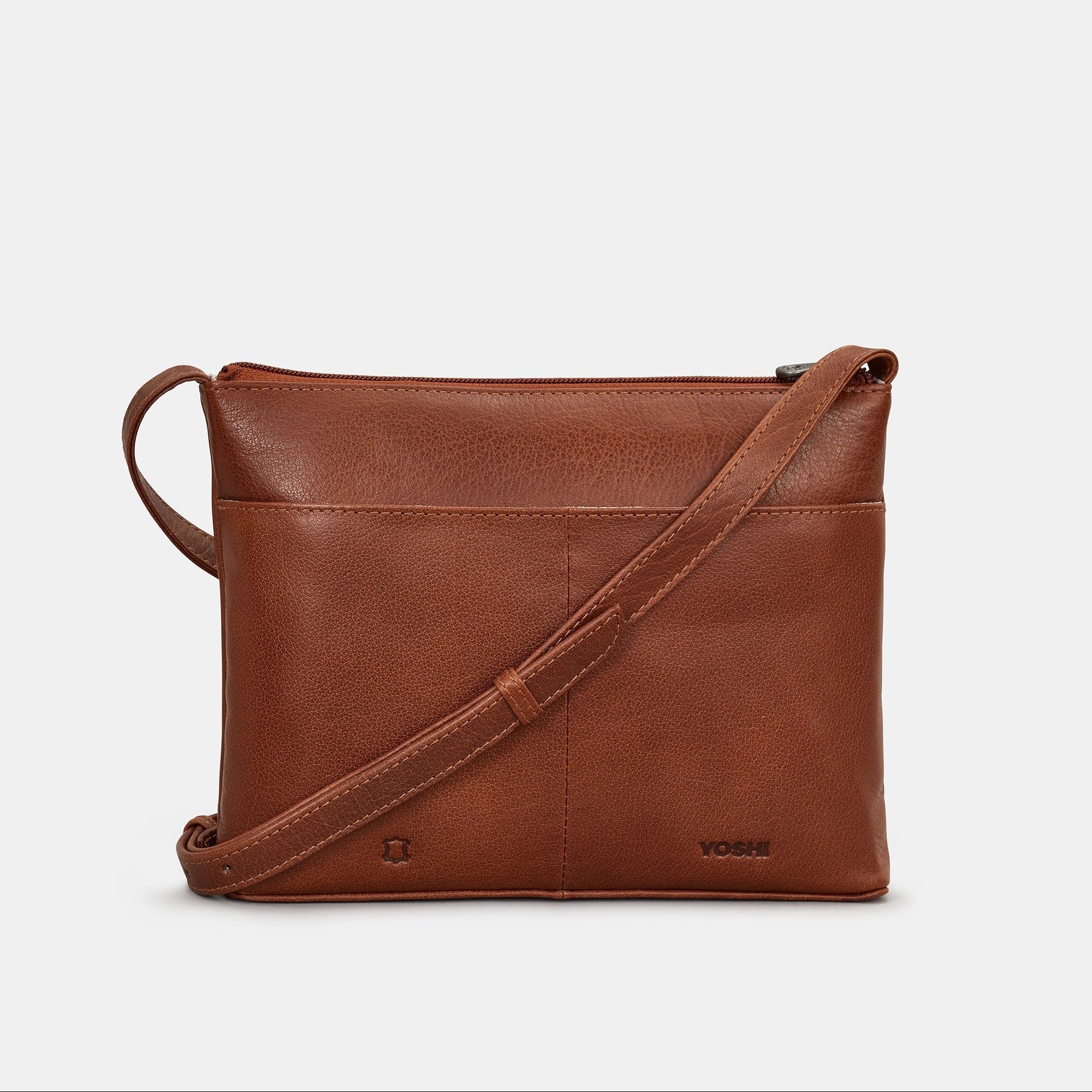 Highland cow crossbody bag brown leather back with slip pocket on white background