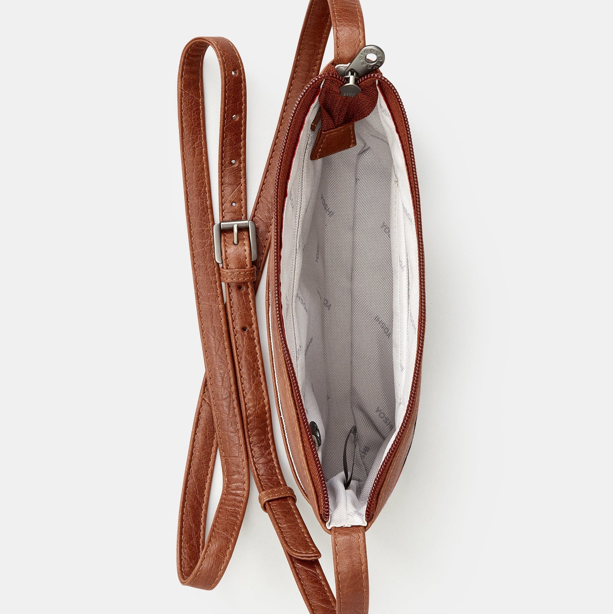 Highland cow crossbody bag overhead showing interior lining and buckle strap