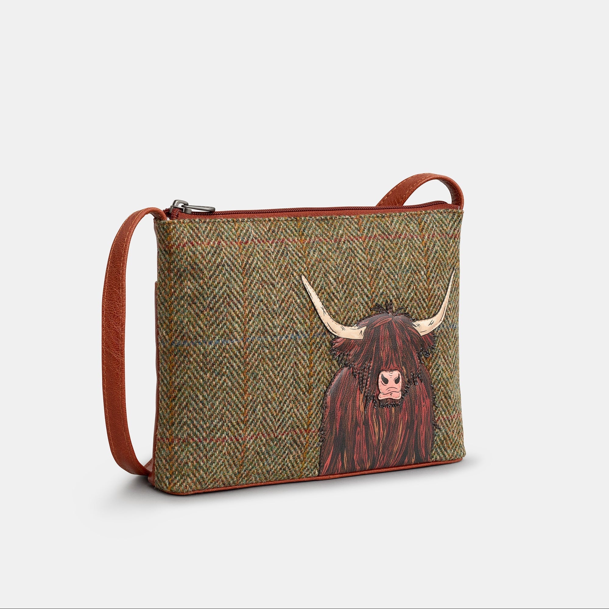 Highland cow crossbody bag side angle with adjustable strap on white background