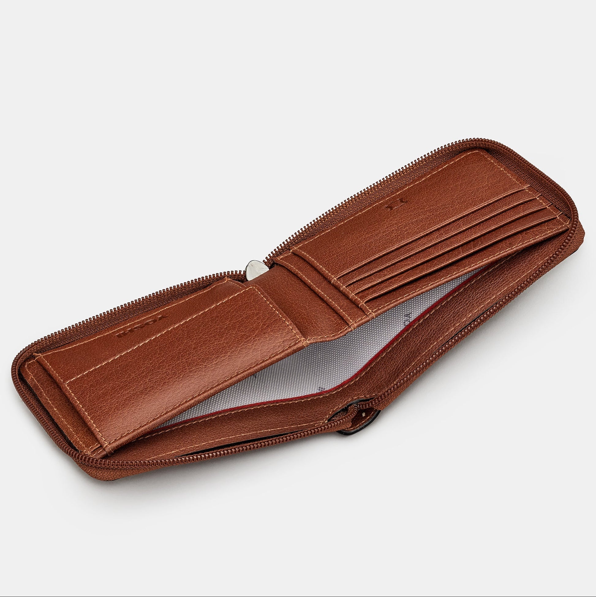 Brown leather zip round wallet overhead flat lay view