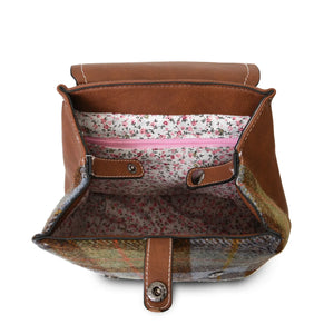 Inside the Harris Tweed Jura Backpack showing the floral lining. 