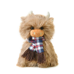 Angus the Highland cow children's soft toy wearing a Harris Tweed scarf.