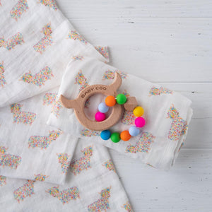 Baby Coo Highland Cow wooden teething ring with matching dribble bib.