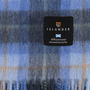 Close up of the Islander label on the scarf showing it is made from 100% lambswool.