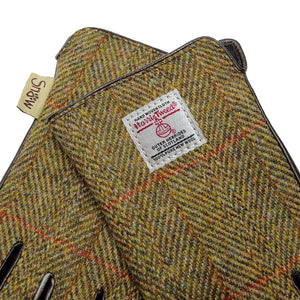Close up of the chestnut herringbone pattern on the men's Harris Tweed gloves.