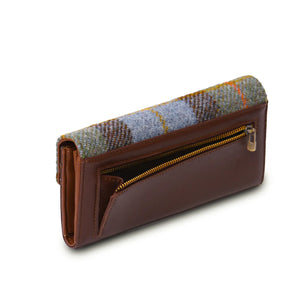 From the back showing the brown PU leather, contrasting Harris Tweed and rear zipped section.