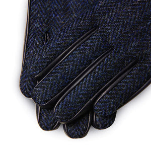 Close up of the fabric of the Navy Herringbone Harris Tweed Ladies Gloves.