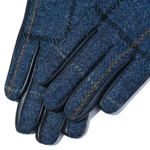 Close up of the fingers of the Ladies Harris Tweed Gloves showing the Navy Tartan pattern.