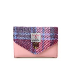 Pink and blue tartan Harris Tweed purse with a classic shape and popper closer. The interior features multiple pockets and compartments for organisation.