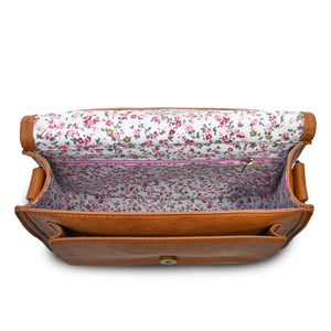 Inside view of a Chesnut (Brown) and Blue Tartan Harris Tweed Saddle Bag, revealing its soft floral lining. The spacious interior offers ample storage for your essentials.