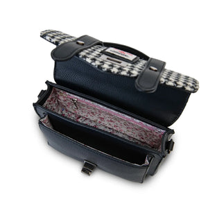 Inside the Islander Black and White Dogtooth Harris Tweed satchel showing the lined interior and the zipped pocket.