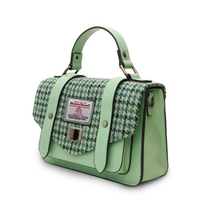 From the side the Islander Harris Tweed Green Dogtoothsatchel style handbag without the shoulder strap.
