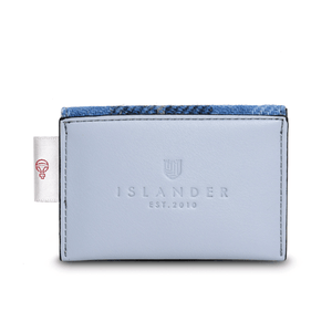 Back view of the card holder showing the blue synthetic leather and islander logo. On the left hand side is the label of authenticity from Harris Tweed. 