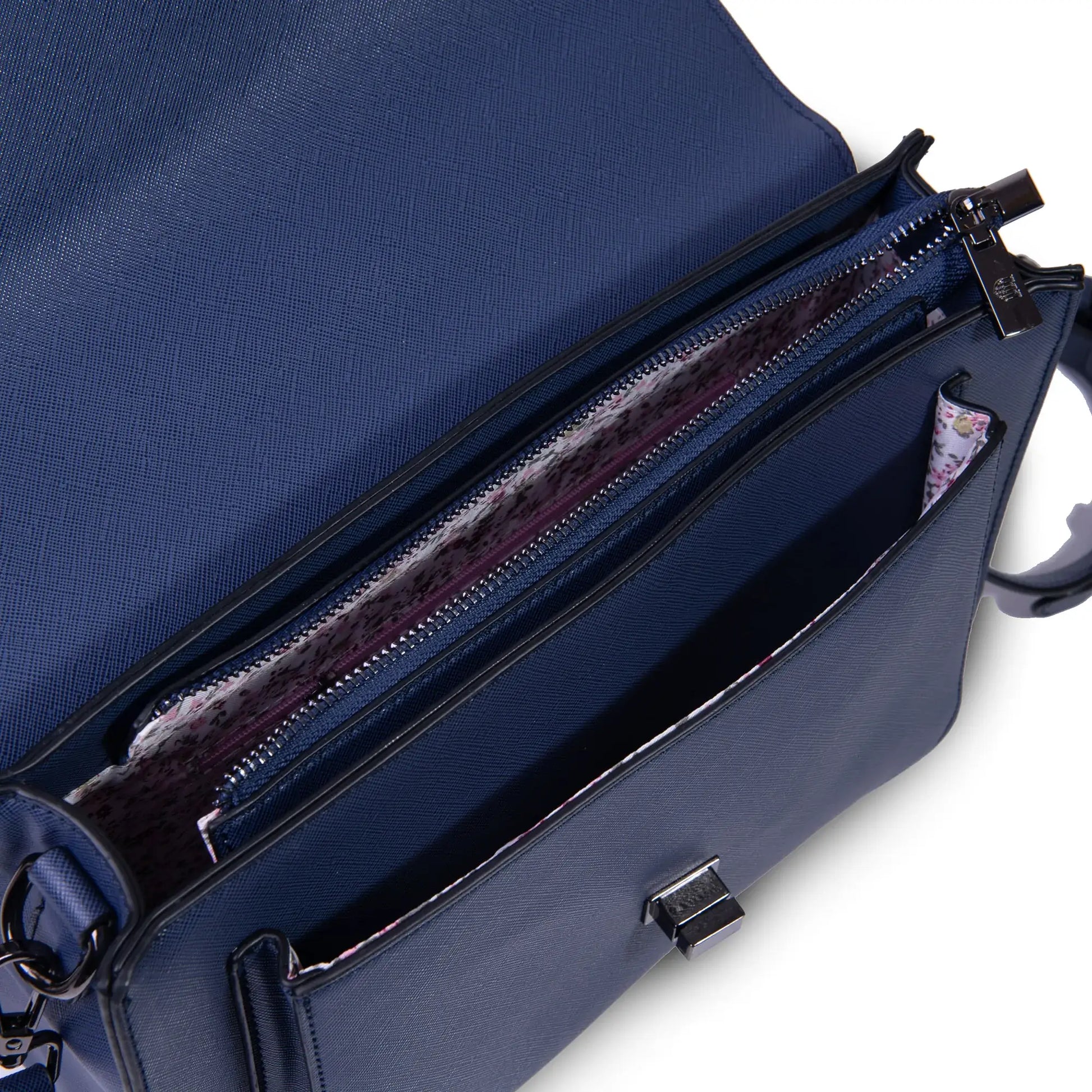 Inside the Islander Navy Over-Check Harris Tweed Satchel showing the internal pockets and zipped compartment.