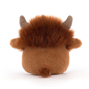 From behind the Jellycat Amuseabean Highland Cow plush toy. 