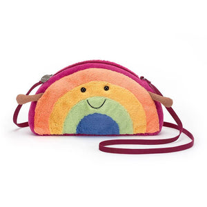 Jellycat Amuseable Rainbow Bag a children's bag in a rainbow design with little arms. 