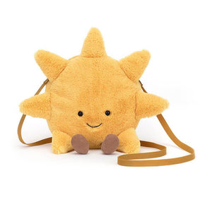 Bright yellow sun shaped bag from Jellycat with a big embroidered smile and a shoulder strap for carrying. 