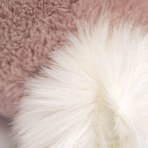 Close up of the fluffy white cotton tail.