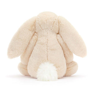 From behind the Jellycat Bashful Luxe Bunny Willow children's soft toy.