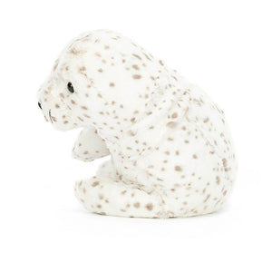 From the side, Jellycat Sigmund Seal children's soft toy.